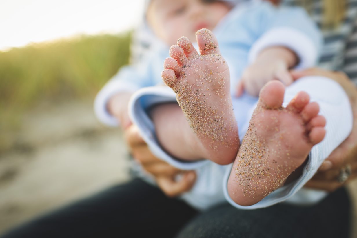 Baby feet with sand